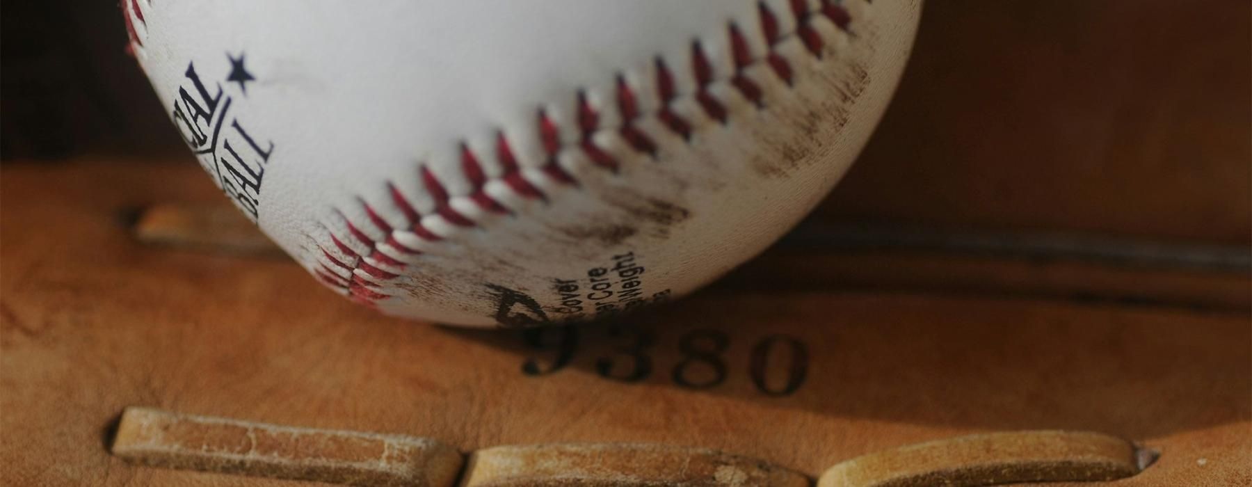 a baseball on a baseball glove